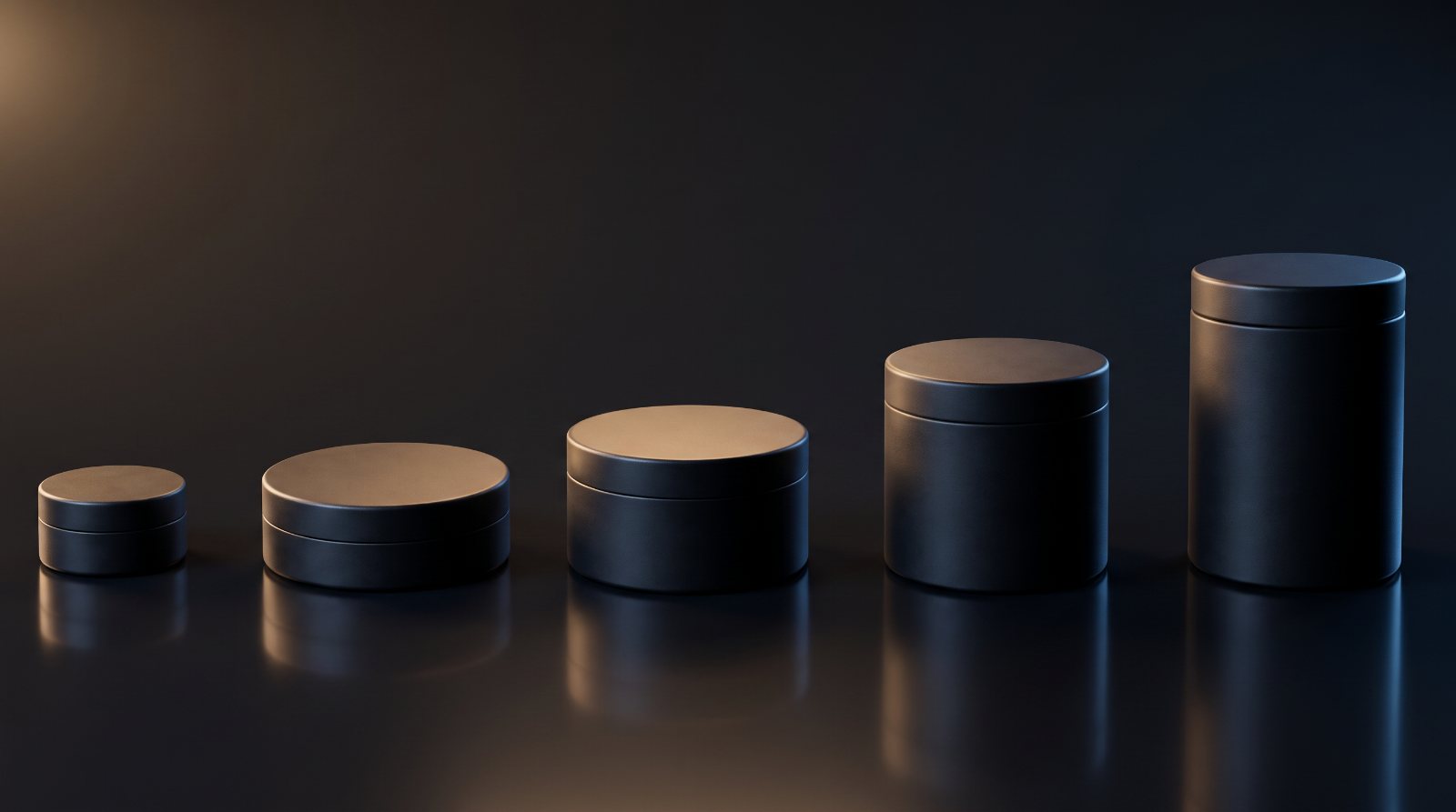 Five Round Tin sizes side by side, shortest to tallest, in matte black